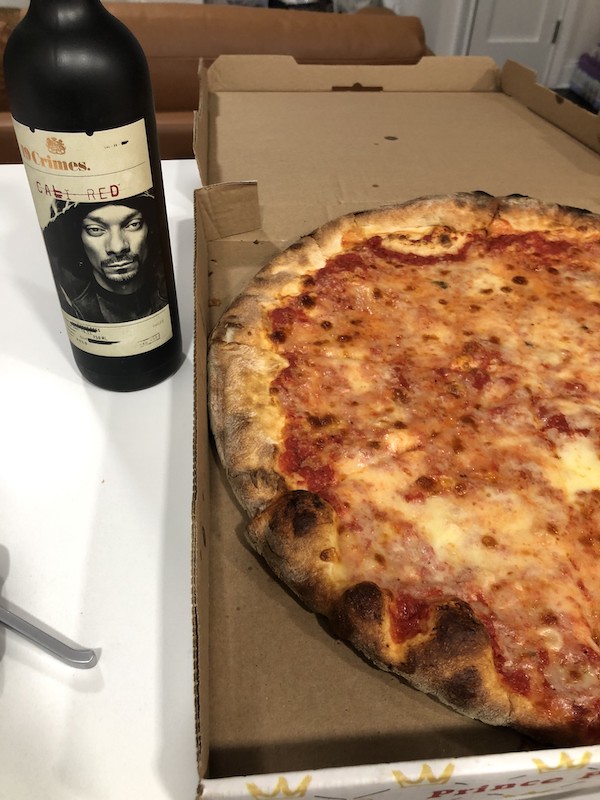 prince street pizza in new york city with red wine | Better Together Here