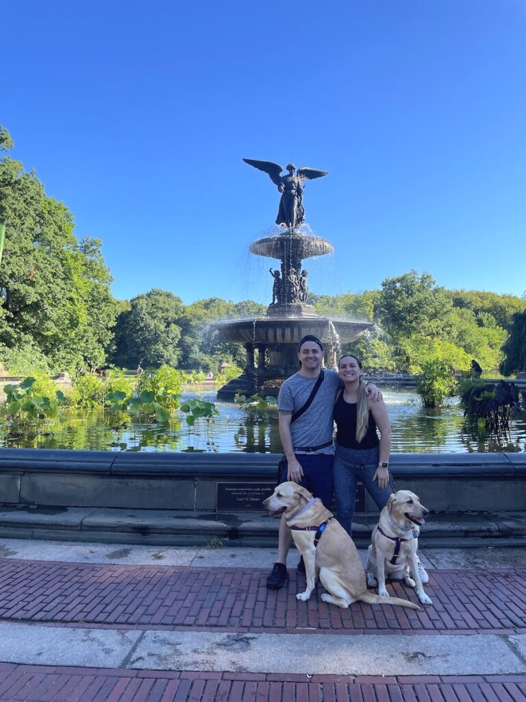 a view of bethesda fountain with two dogs and a couple | Better Together Here 