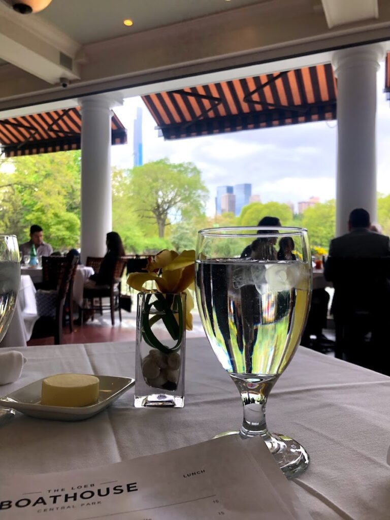 a view of the new york city skyline while eating at the loeb boathouse restaurant | Better Together Here 