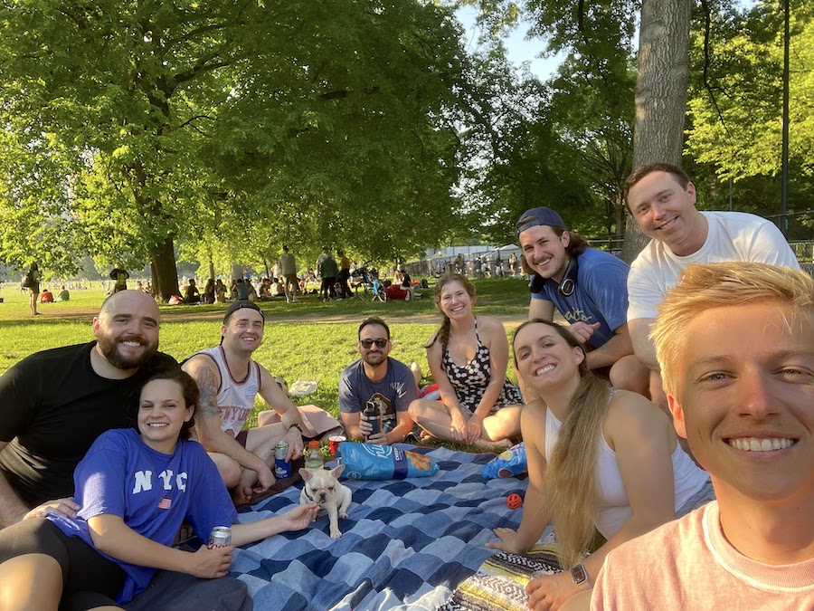a group of friends having a picnic in sheep meadow central park | Better Together Here