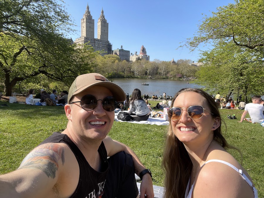 a couple having a picnic at cherry hill in Central Park | Better Together Here 