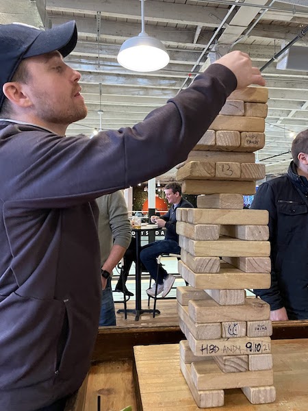 a giant jenga game at a shuffleboard bar in brooklyn new york | Better Together Here 