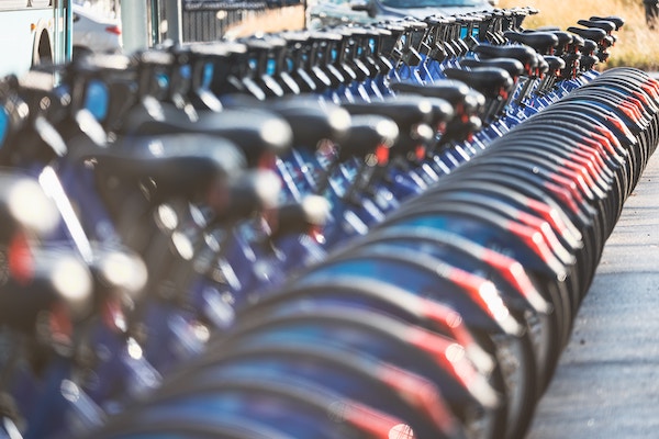 a row of citi bikes in new york | Better Together Here