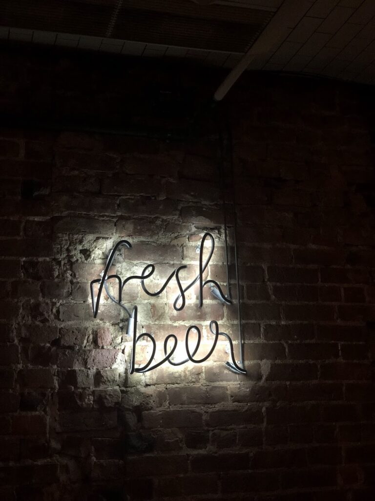 fresh beer sign at as is bar one of the best bars in hell's kitchen | Better Together Here