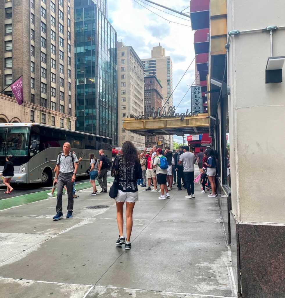 people standing in the middle of the sidewalk in new york city | Better Together Here