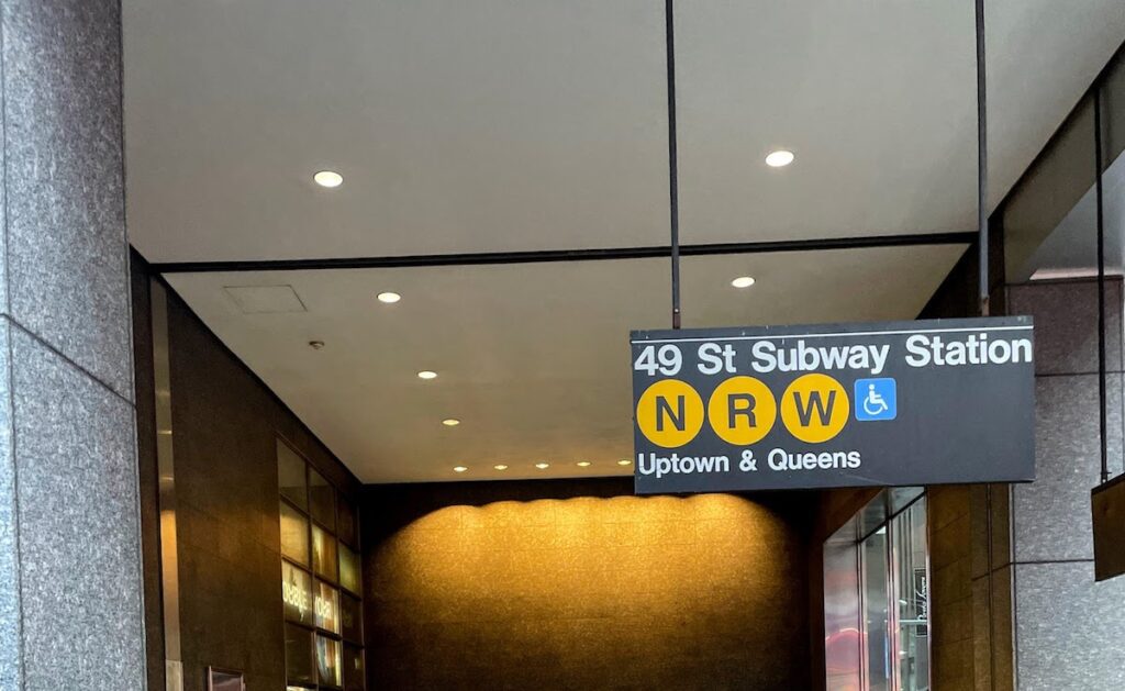 49 street subway station indicating an uptown entrance | Better Together Here