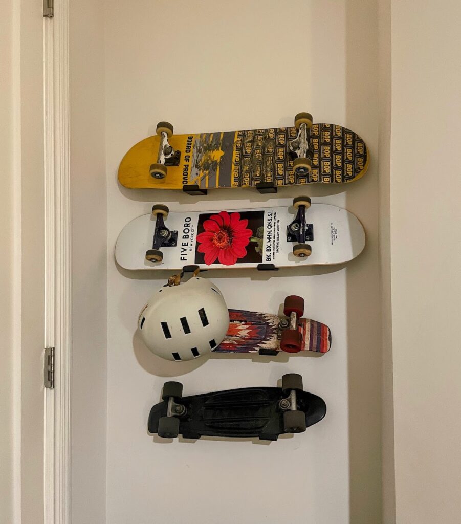 skateboards mounted on the wall | Better Together Here