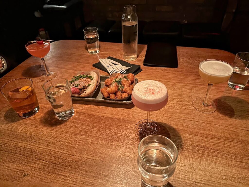 picture of cocktail and food from please don't tell | Better Together Here