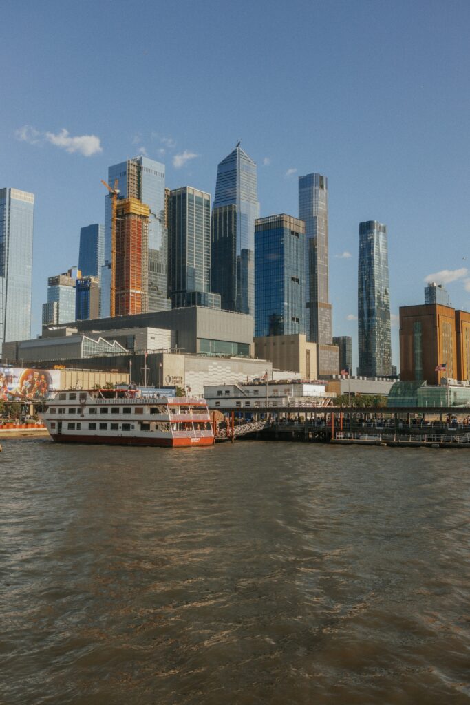 tourists getting onto a boat part of the nyc pass | Better Together Here